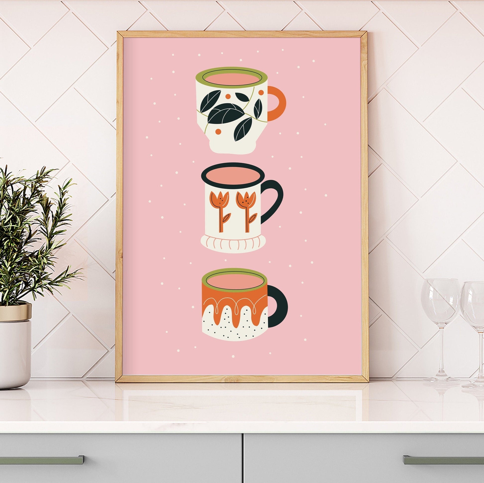 An illustration print of three quirky mug designs, in orange, ream, black and green on a pink background.