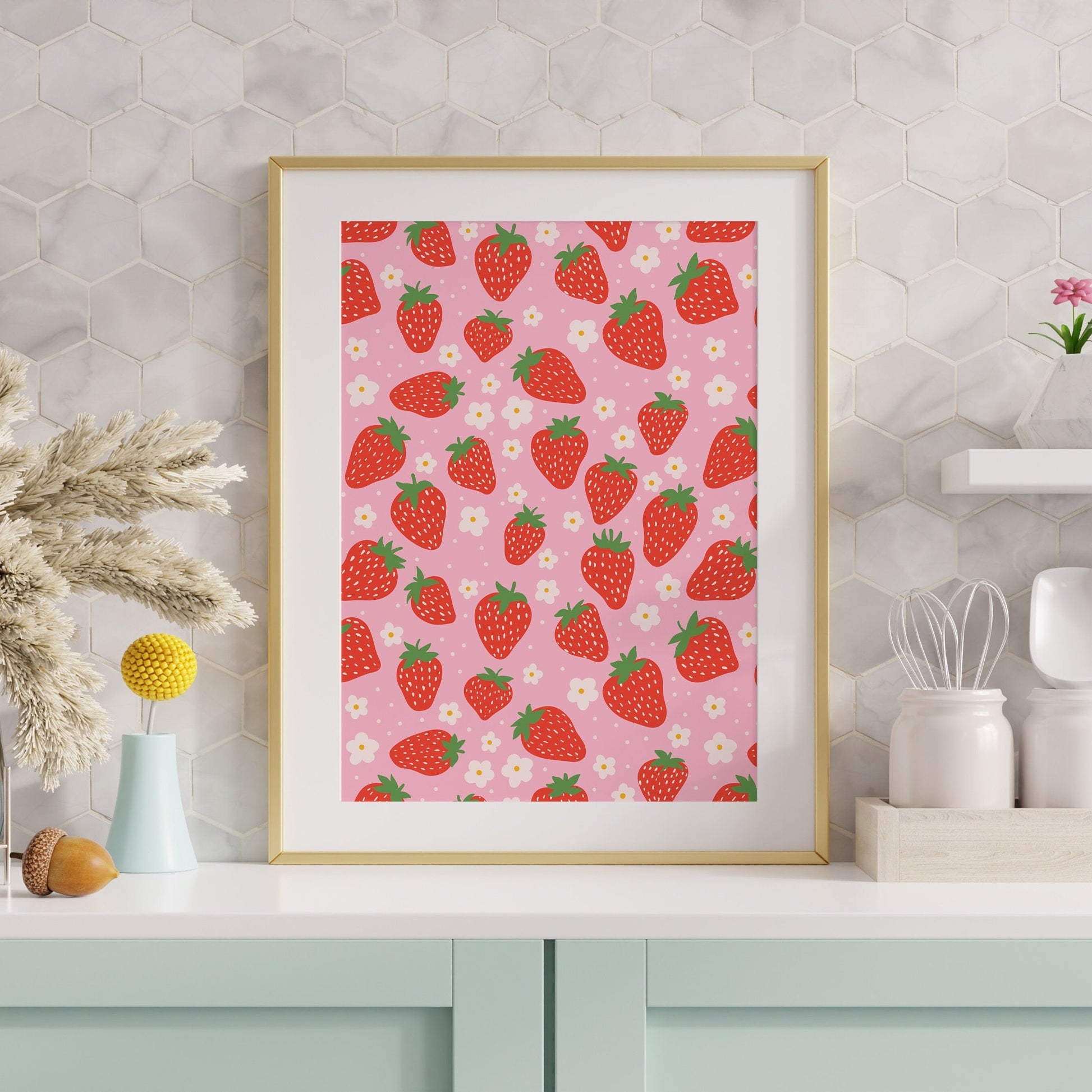 A vibrant pattern featuring strawberries and small white daisies, on a pink background. 