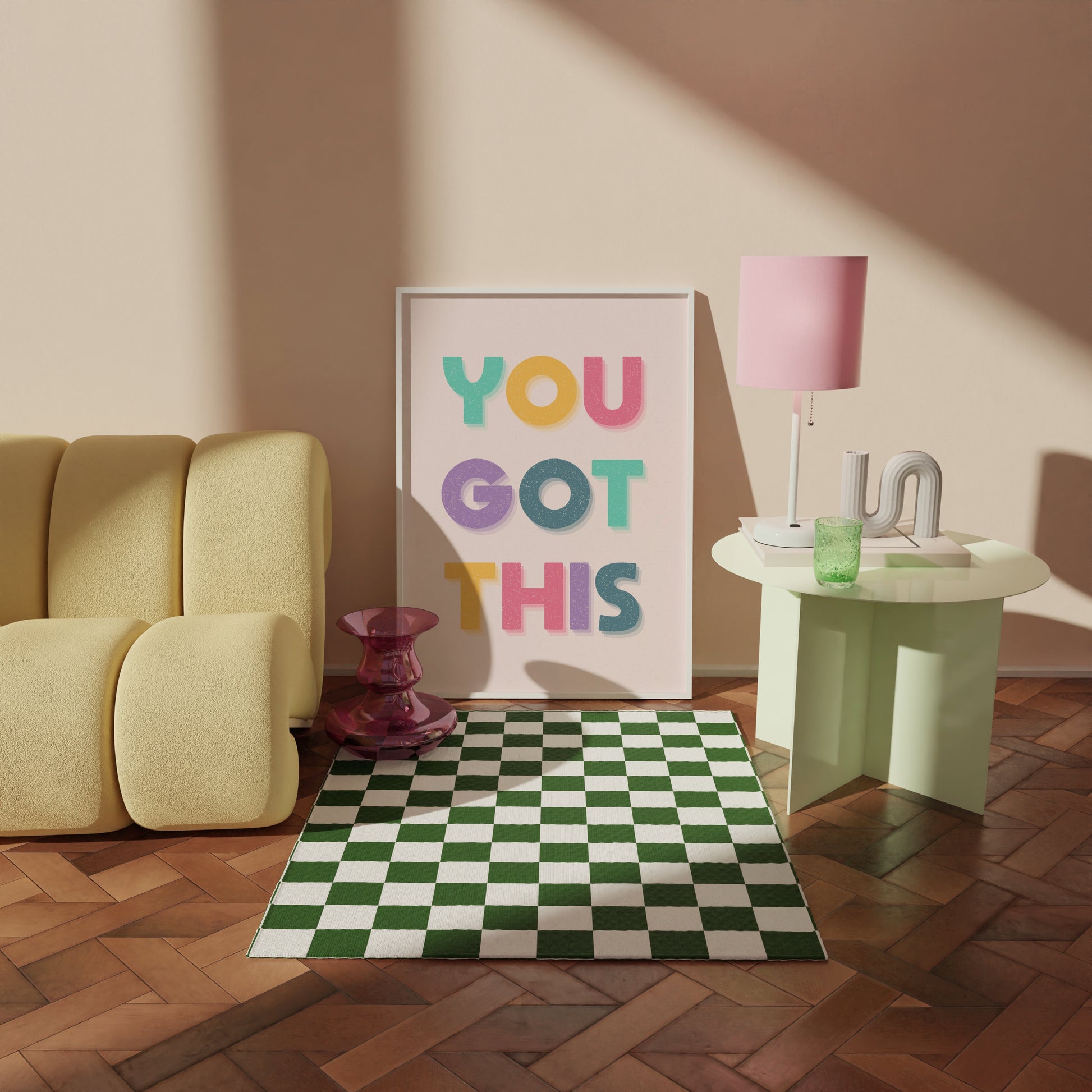 A motivational print with multicoloured lettering, saying You Got This.